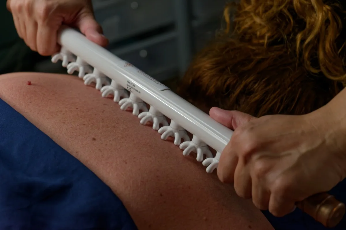 FasciaBlasting treatment during massage session at Red Coral Spa