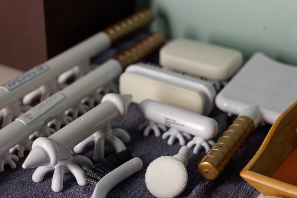 FasciaBlaster tools laid out for treatment at Red Coral Spa