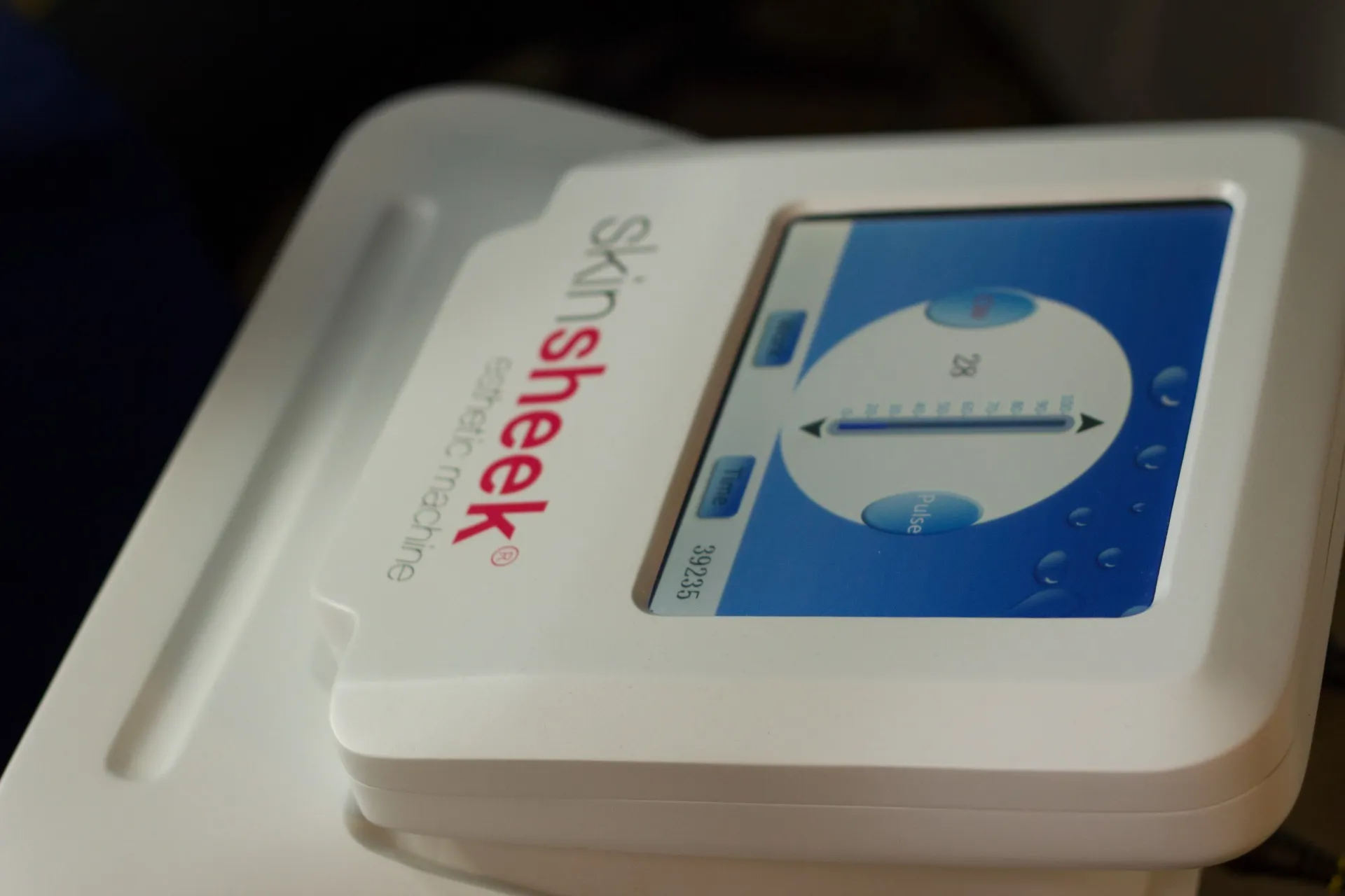 Skin Sheek Esthetic Machine display at Central Coast Red Coral Spa